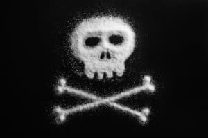 A skull and crossbones represents the danger of fish scale cocaine.